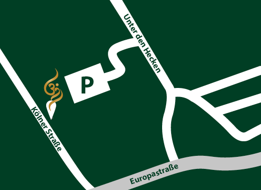 Anfahrtskarte zum Om Ayurveda Standort in der Kölner Straße mit eingezeichneter Zufahrt zum Parkplatz über die Straße 'Unter den Hecken' und angrenzender Europastraße.